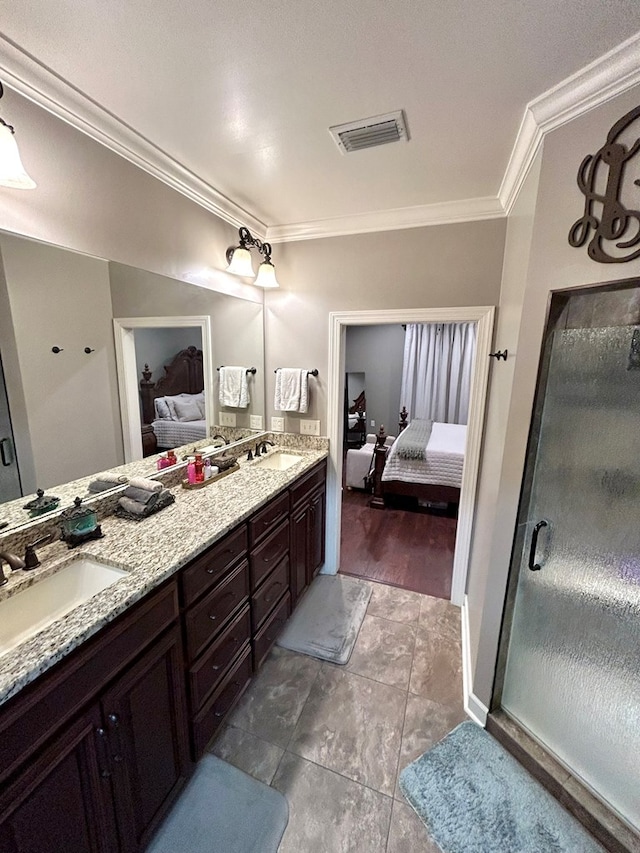 bathroom with vanity, hardwood / wood-style flooring, an enclosed shower, and ornamental molding