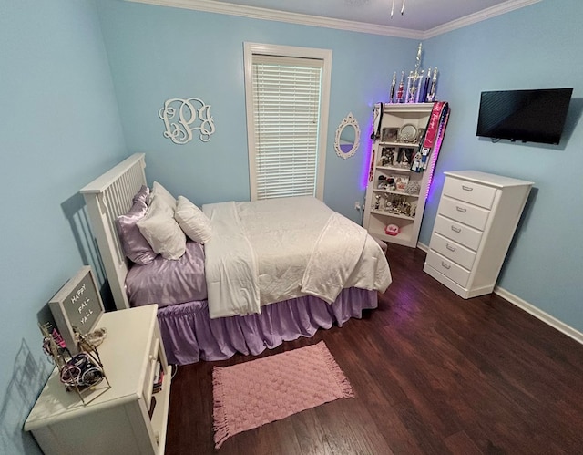 bedroom featuring crown molding and dark hardwood / wood-style floors