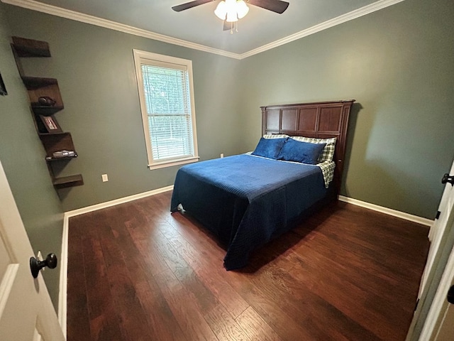 bedroom featuring dark hardwood / wood-style floors, ceiling fan, and ornamental molding