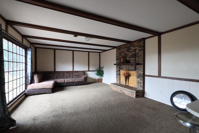 806 Mayfair St, Dothan, AL 36301 - carpeted living area featuring beamed ceiling, healthy amount of natural light, and a brick fireplace