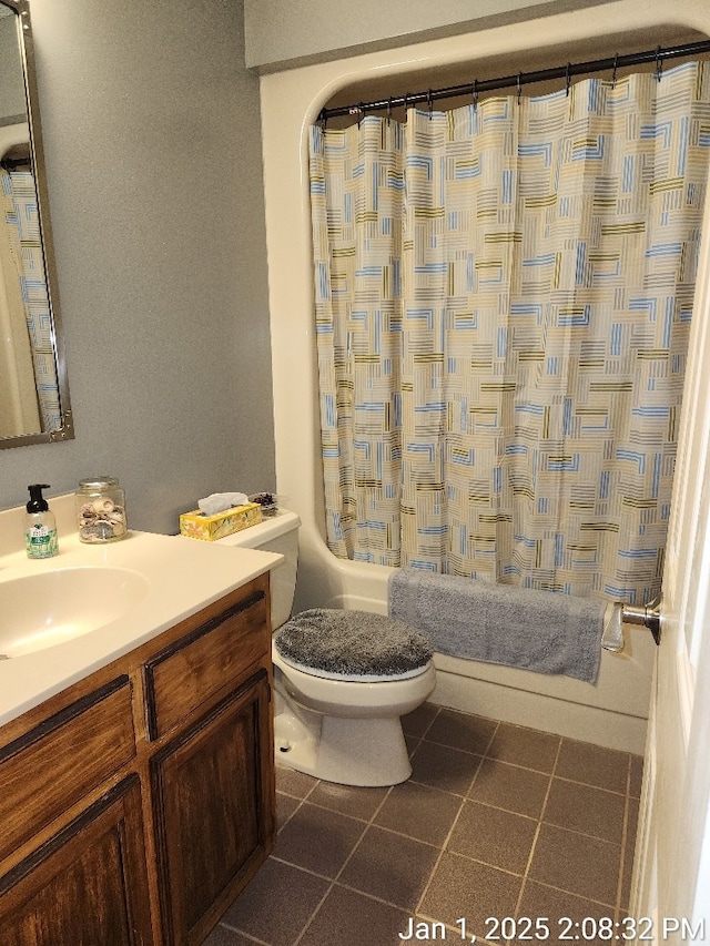 full bathroom with tile patterned flooring, shower / bath combination with curtain, toilet, and vanity