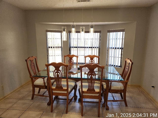 view of tiled dining room