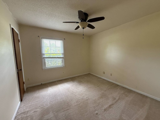 202 Candace Ct, Dothan, AL 36301 - empty room featuring ceiling fan, light colored carpet, baseboards, and a textured ceiling