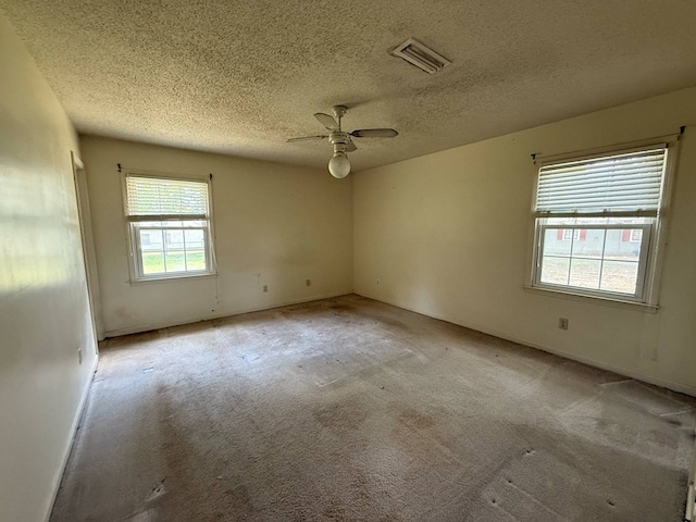 202 Candace Ct, Dothan, AL 36301 - empty room featuring ceiling fan, light colored carpet, a textured ceiling, and baseboards
