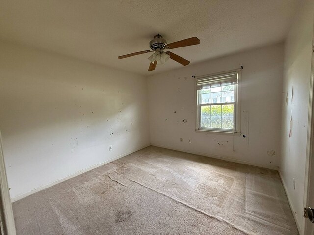202 Candace Ct, Dothan, AL 36301 - empty room featuring a ceiling fan, light carpet, and baseboards