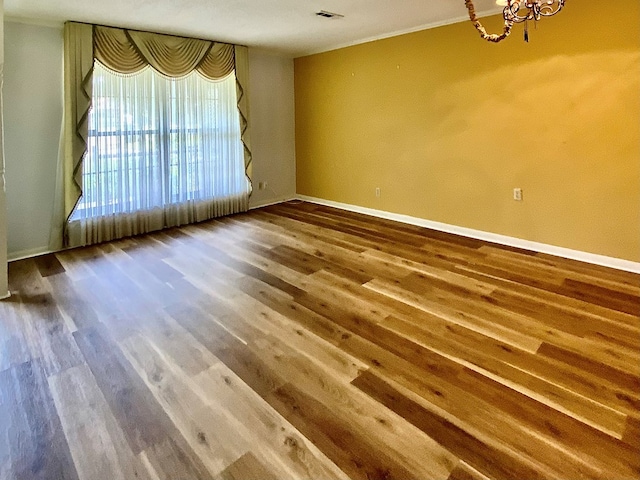 103 Peartree Cir, Dothan, AL 36301 - spare room featuring wood finished floors and baseboards