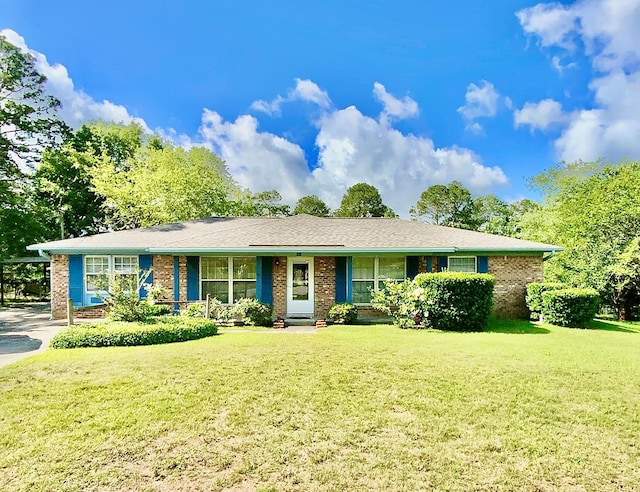 103 Peartree Cir, Dothan, AL 36301 - ranch-style house featuring a front lawn and brick siding