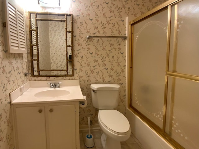 103 Peartree Cir, Dothan, AL 36301 - full bathroom featuring wallpapered walls, vanity, toilet, combined bath / shower with glass door, and tile patterned flooring