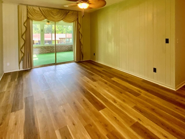 103 Peartree Cir, Dothan, AL 36301 - spare room featuring wood finished floors, ceiling fan, and baseboards