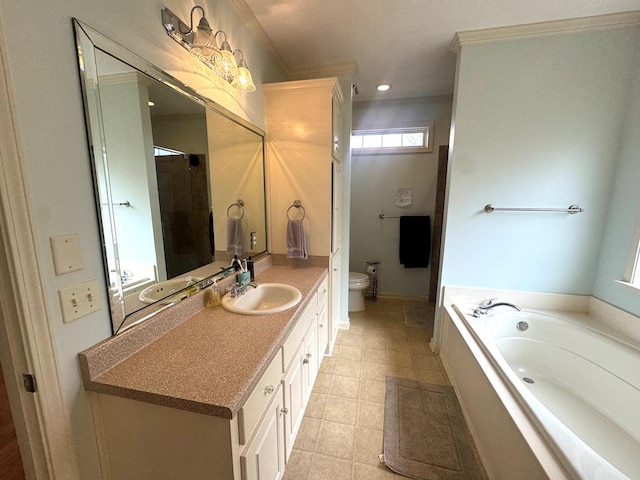 bathroom featuring recessed lighting, vanity, toilet, and a bath