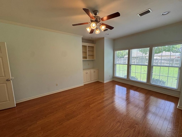 108 Sunshine Ln, Dothan, AL 36303 - unfurnished room featuring ornamental molding, a ceiling fan, wood finished floors, and baseboards