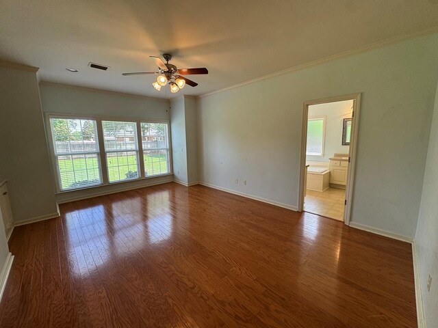 108 Sunshine Ln, Dothan, AL 36303 - empty room with a ceiling fan, ornamental molding, wood finished floors, and baseboards