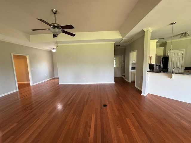 108 Sunshine Ln, Dothan, AL 36303 - unfurnished living room featuring ceiling fan, dark wood-type flooring, baseboards, and ornamental molding