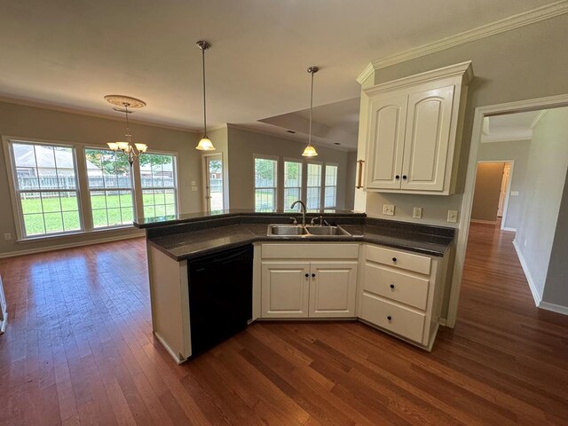 108 Sunshine Ln, Dothan, AL 36303 - kitchen with black dishwasher, a sink, dark countertops, ornamental molding, and dark wood-style floors