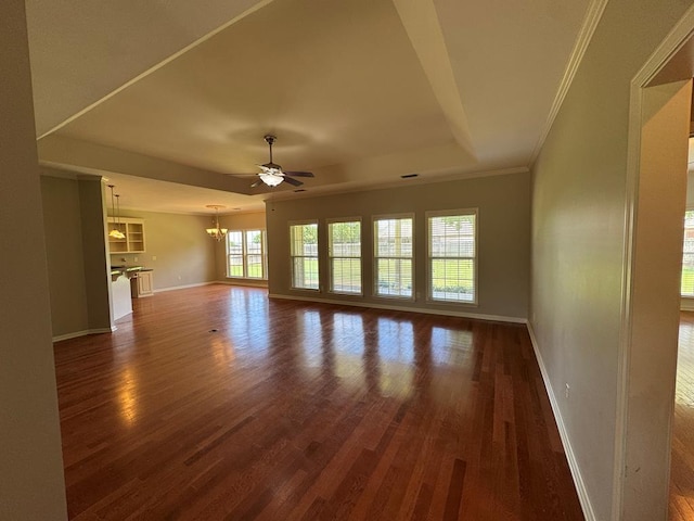 108 Sunshine Ln, Dothan, AL 36303 - unfurnished living room with baseboards, a chandelier, ceiling fan, dark wood-type flooring, and crown molding