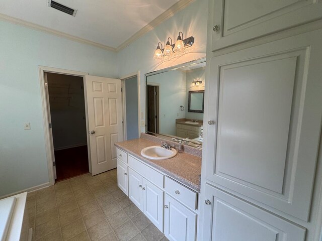 108 Sunshine Ln, Dothan, AL 36303 - bathroom with ornamental molding, vanity, and tile patterned flooring