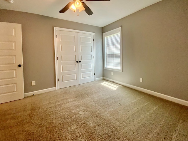 503 Cedar Grove Ln, Enterprise, AL 36330 - unfurnished bedroom featuring carpet, a ceiling fan, and a closet