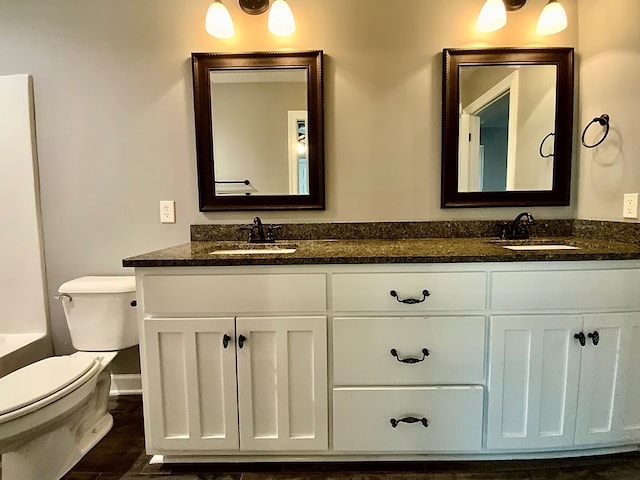 503 Cedar Grove Ln, Enterprise, AL 36330 - bathroom with double vanity and wood finished floors