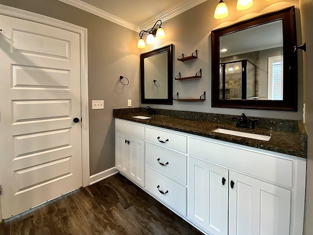503 Cedar Grove Ln, Enterprise, AL 36330 - full bath with crown molding, double vanity, a shower with shower door, and wood finished floors