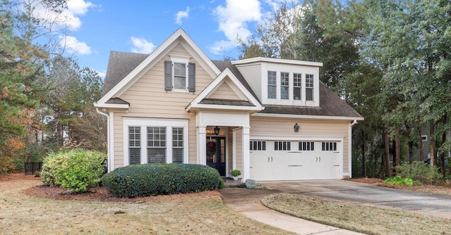 view of front of property with a garage