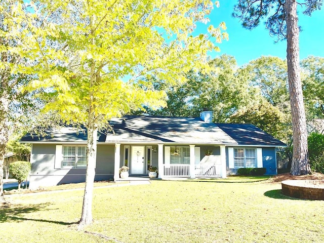 single story home featuring a front yard and a porch