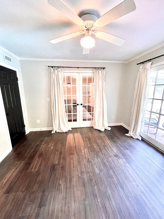 interior space with ceiling fan, french doors, dark wood-type flooring, and ornamental molding