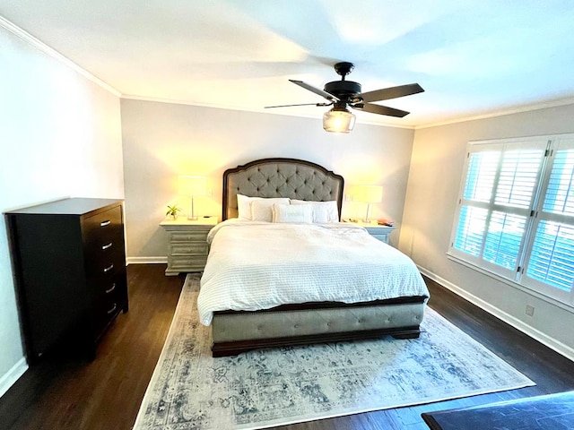 bedroom with ceiling fan, dark hardwood / wood-style floors, and ornamental molding