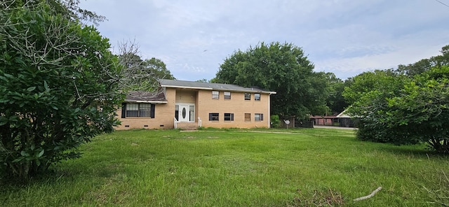 1638 Denton Rd, Dothan, AL 36303 - rear view of property featuring crawl space, a yard, entry steps, and brick siding