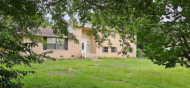 1638 Denton Rd, Dothan, AL 36303 - view of front facade with crawl space, brick siding, and a front yard