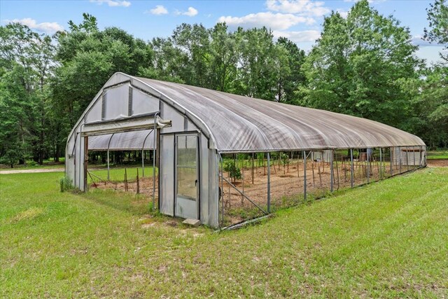 3195 Singletary Rd, Slocomb, AL 36375 - view of greenhouse with a lawn
