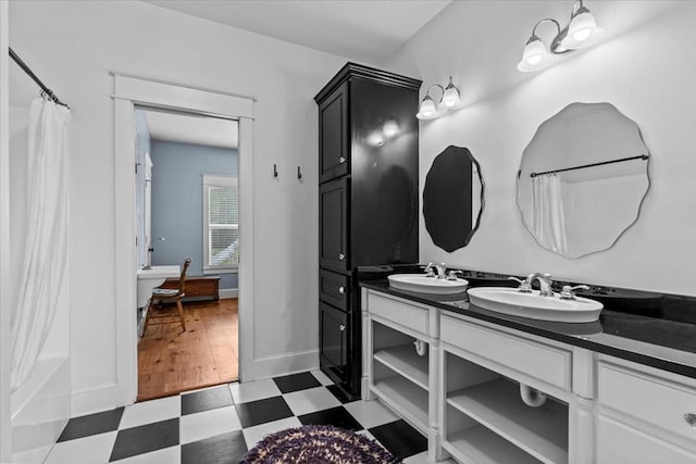 3195 Singletary Rd, Slocomb, AL 36375 - bathroom featuring tile patterned floors and double vanity