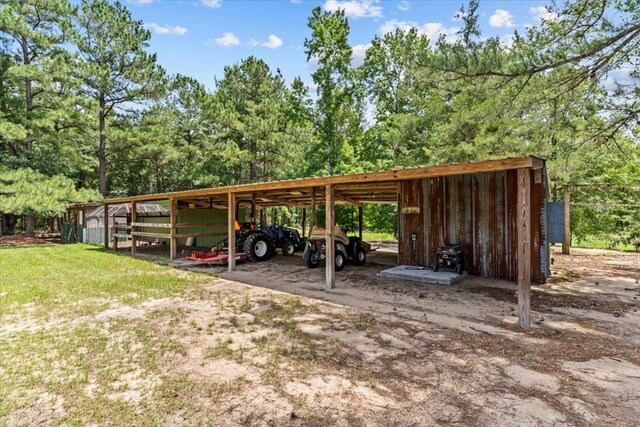 3195 Singletary Rd, Slocomb, AL 36375 - view of vehicle parking with an outbuilding