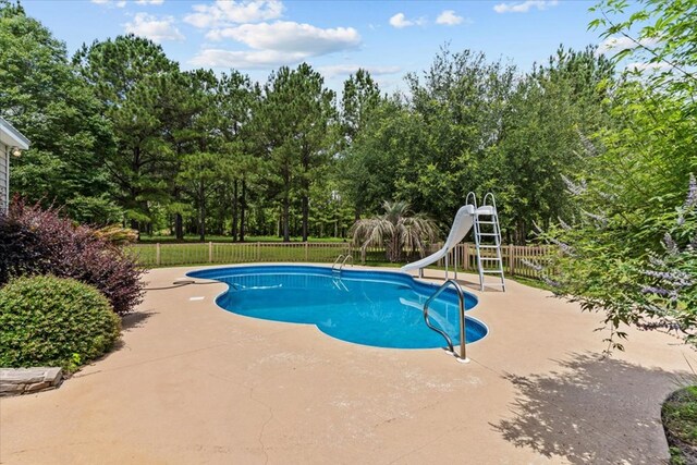 3195 Singletary Rd, Slocomb, AL 36375 - view of pool with a water slide and a patio area