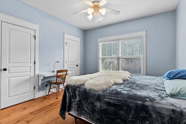 3195 Singletary Rd, Slocomb, AL 36375 - bedroom featuring light wood-style floors and a ceiling fan