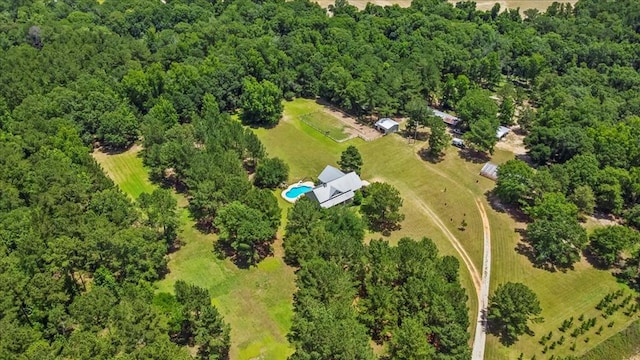 3195 Singletary Rd, Slocomb, AL 36375 - aerial view of property and surrounding area featuring a forest and a pool area