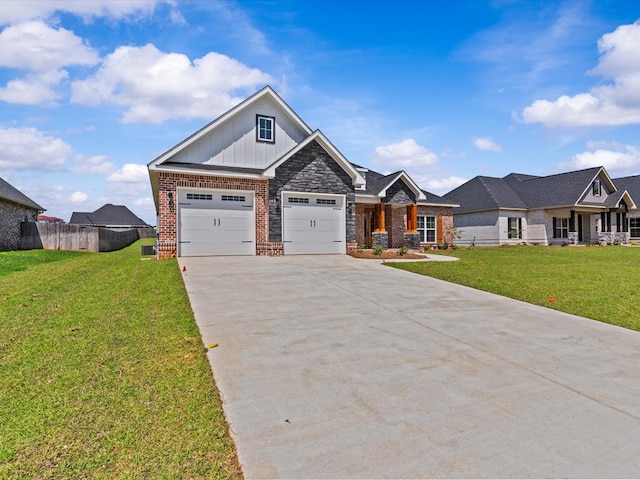craftsman house with board and batten siding, driveway, brick siding, and a garage