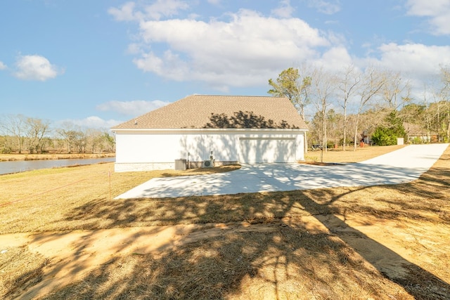 view of home's exterior featuring a water view