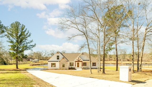 view of front of home with a front yard