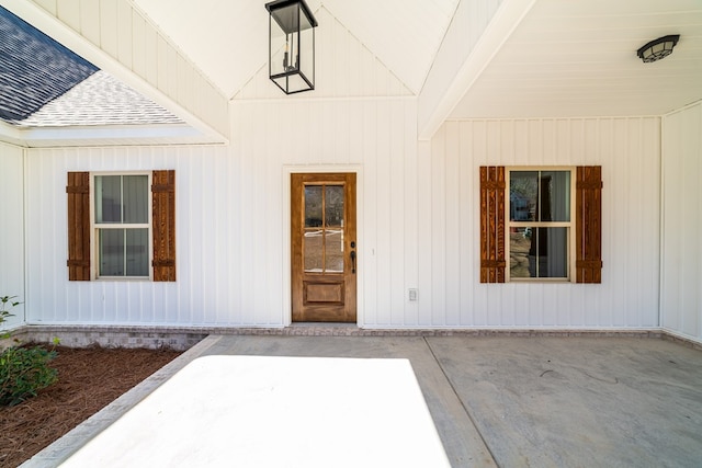 doorway to property with a patio area