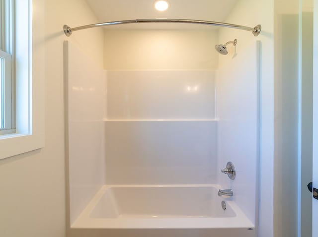 bathroom with shower / bathing tub combination