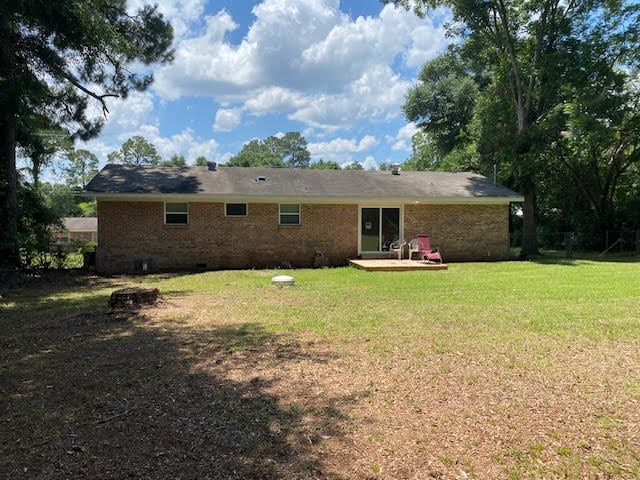 2308 Debbie Dr, Dothan, AL 36301 - back of house with a lawn, brick siding, and crawl space