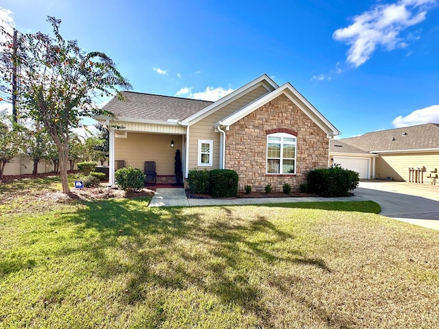 view of front facade featuring a garage and a front yard