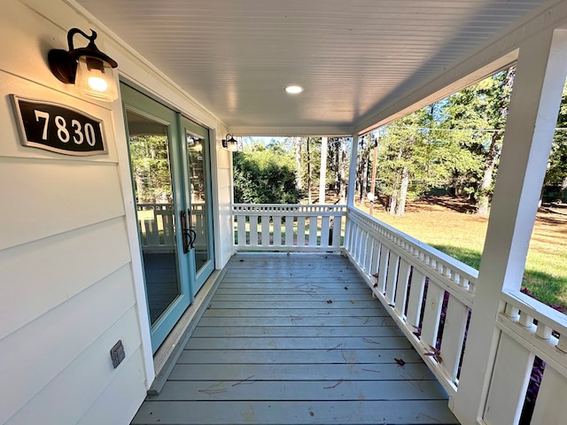 wooden deck featuring a porch