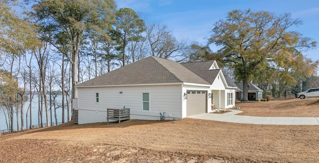 view of property exterior with a garage