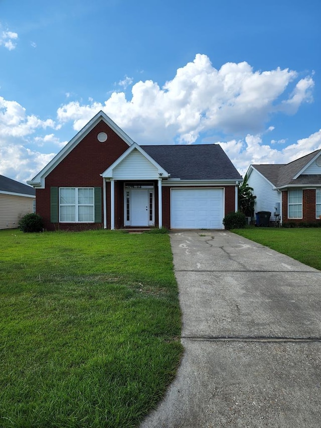 ranch-style home featuring a front lawn and a garage