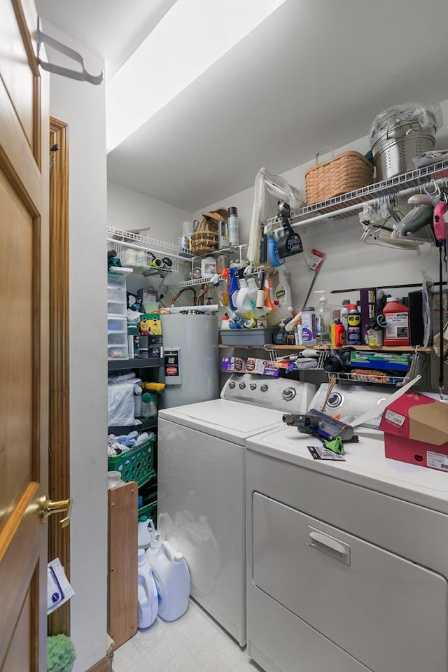 876 Boat Landing Rd, Gordon, AL 36343 - laundry room with separate washer and dryer, electric water heater, and light floors