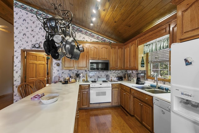 876 Boat Landing Rd, Gordon, AL 36343 - kitchen with white appliances, a sink, vaulted ceiling, wallpapered walls, and wood ceiling