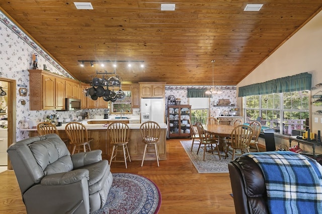 876 Boat Landing Rd, Gordon, AL 36343 - living room with wood ceiling, wallpapered walls, a chandelier, high vaulted ceiling, and light wood-style floors