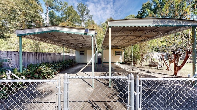 view of parking with a carport