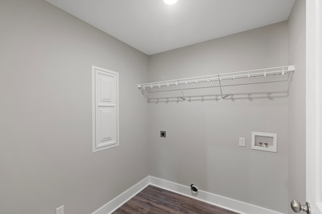 laundry room with electric dryer hookup, washer hookup, and dark hardwood / wood-style floors